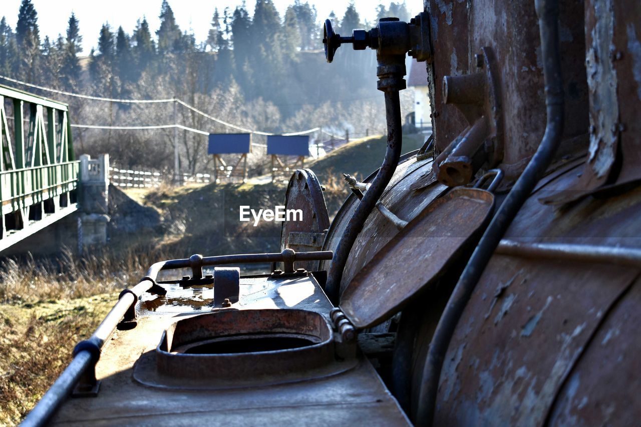 Close-up of abandoned rusty metallic vehicle