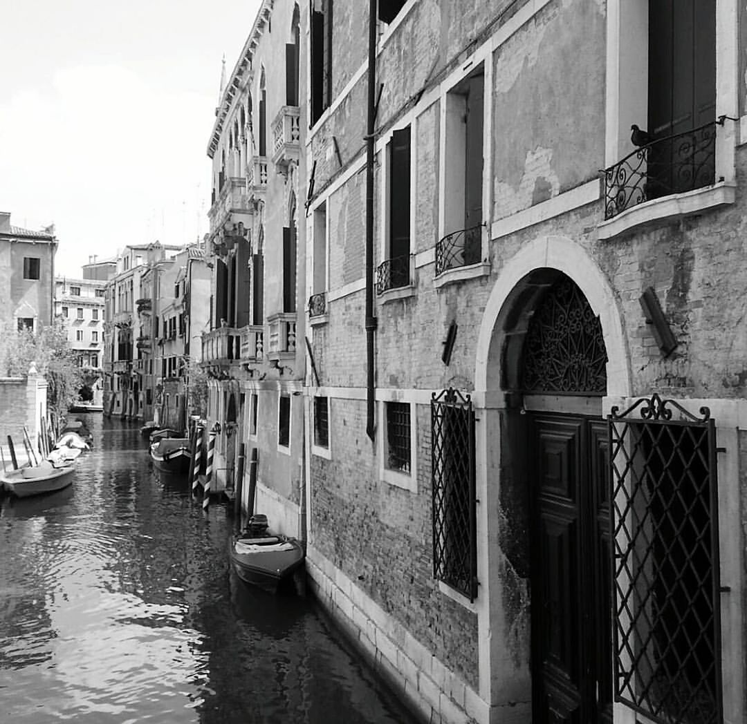 VIEW OF CANAL ALONG BUILDINGS