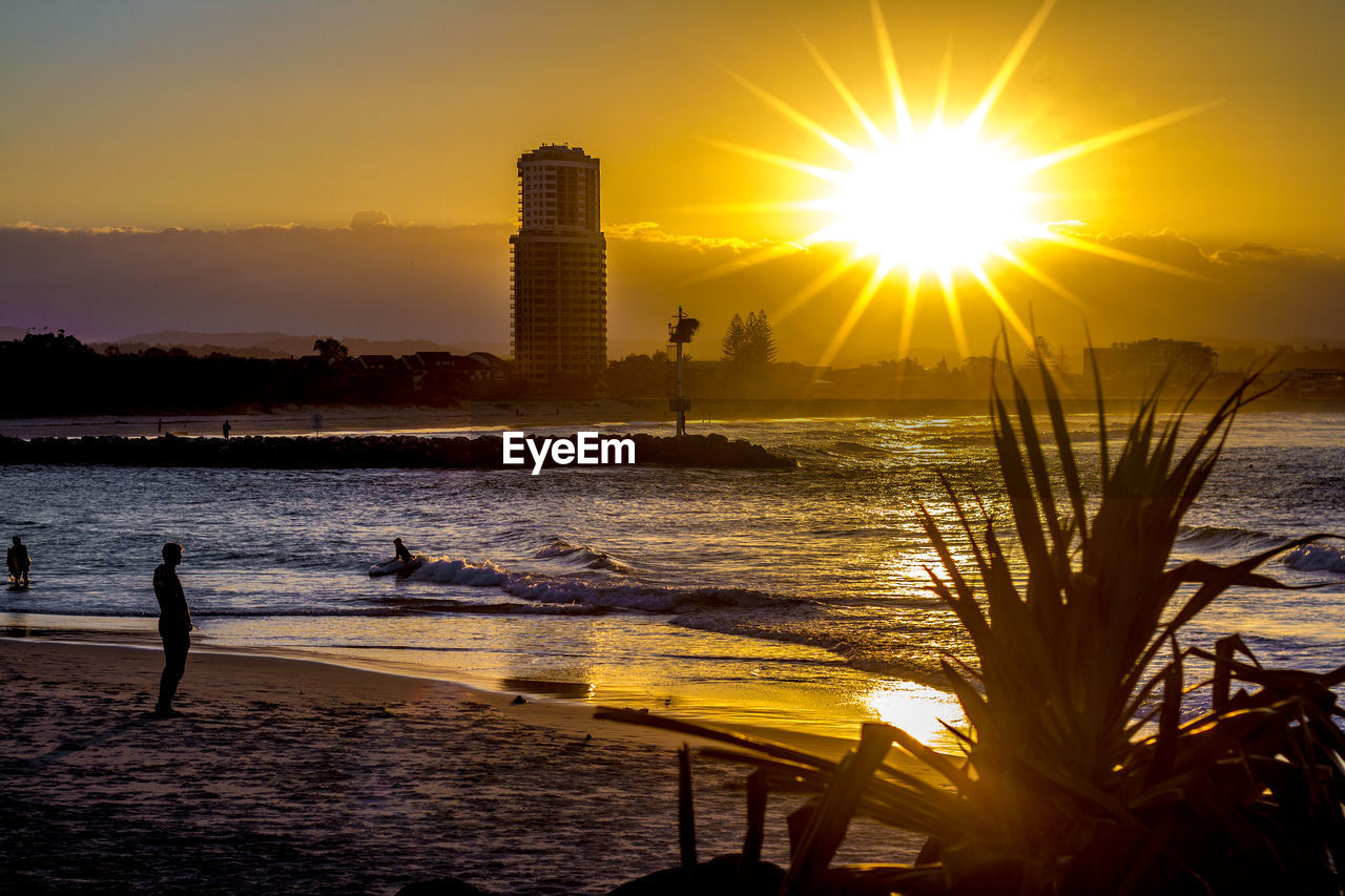 SCENIC VIEW OF SUNSET OVER SEA