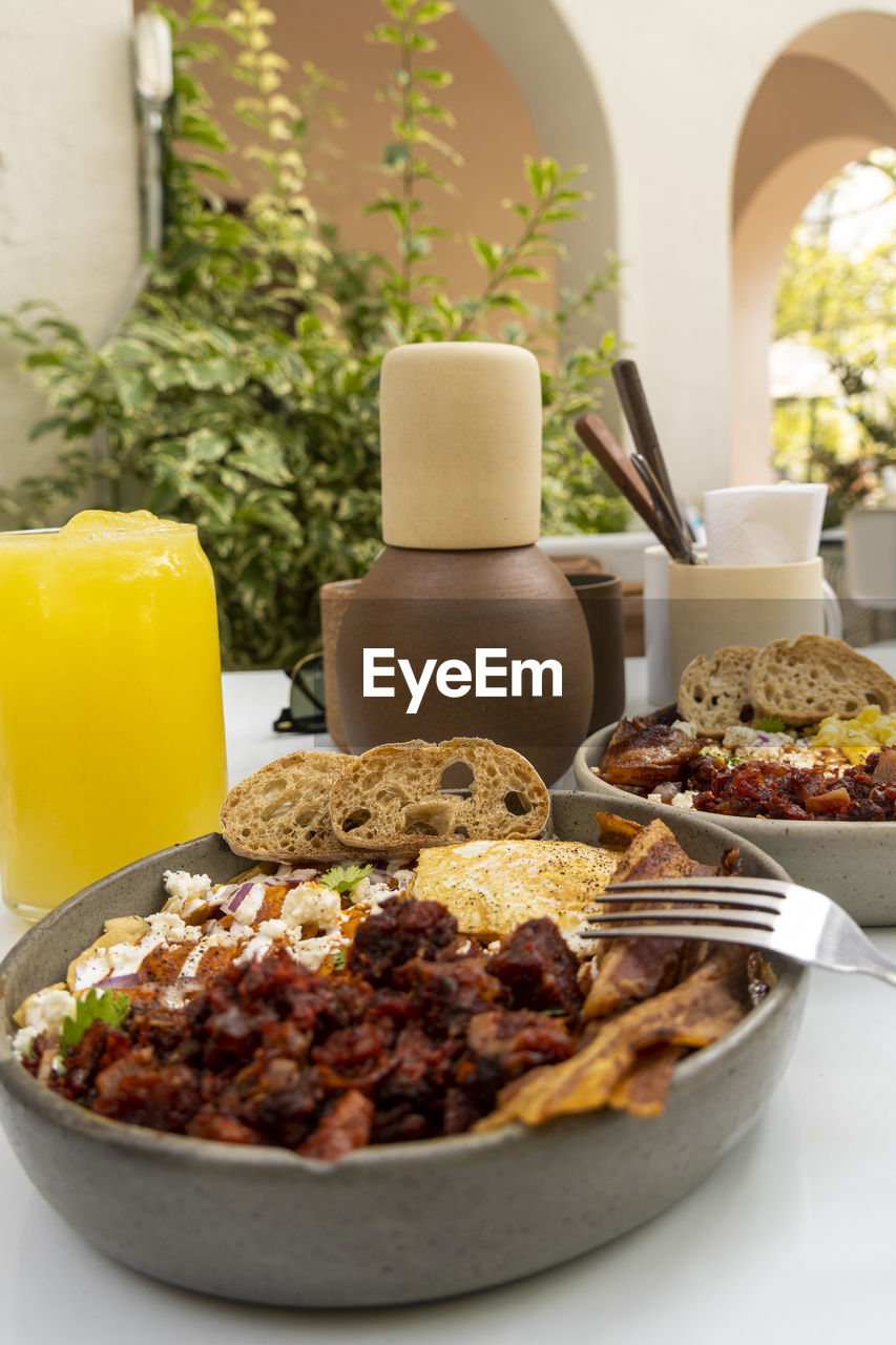 food and drink, food, breakfast, meal, dish, drink, healthy eating, juice, produce, indoors, freshness, no people, wellbeing, refreshment, fruit, brunch, household equipment, table, glass, dairy, plate, drinking glass