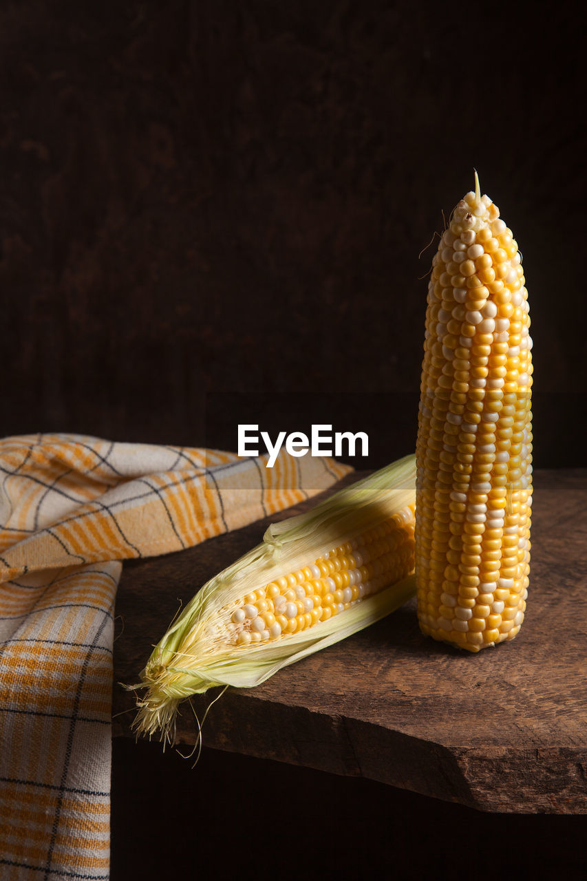 close-up of corn against black background