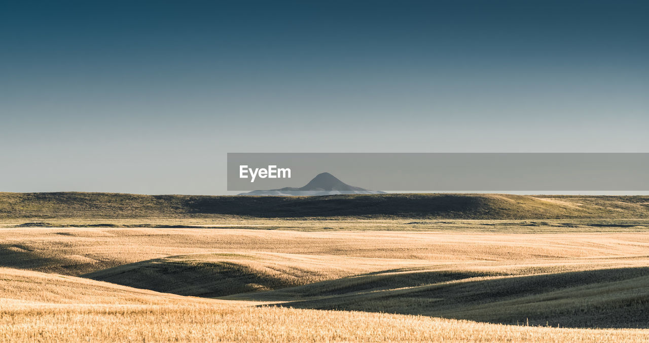 Scenic view of desert against sky