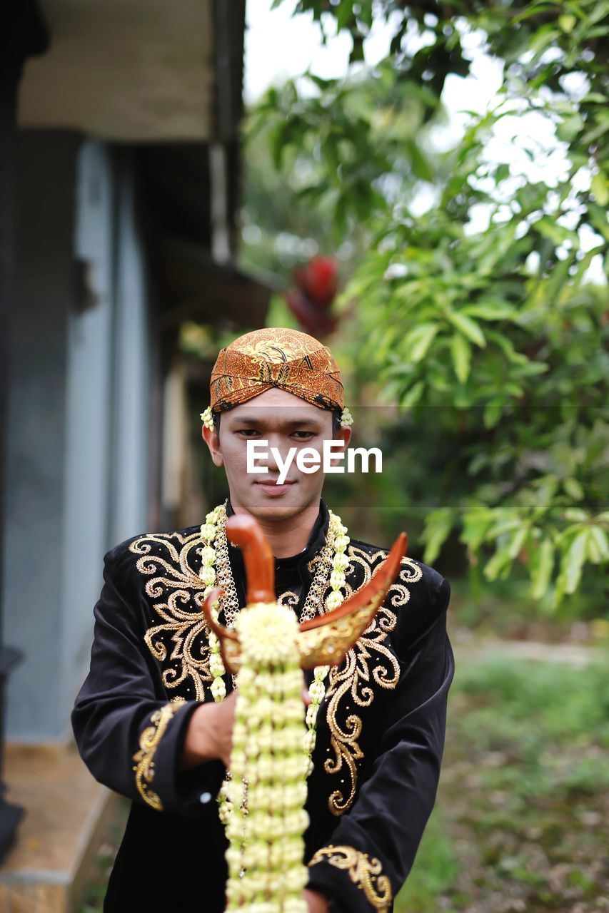 Traditional wedding clothes for men from central java.