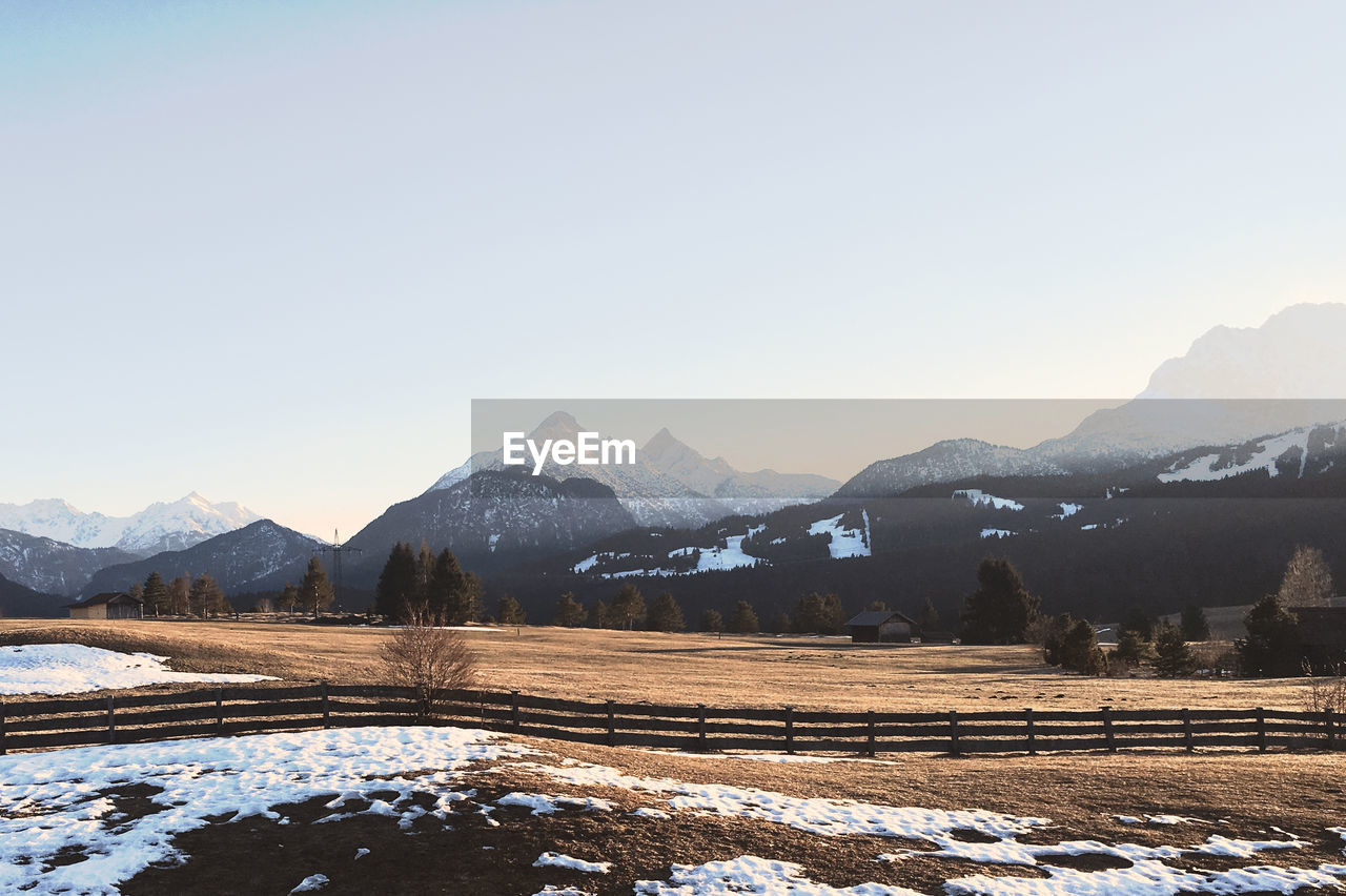 SNOWCAPPED MOUNTAINS AGAINST CLEAR SKY