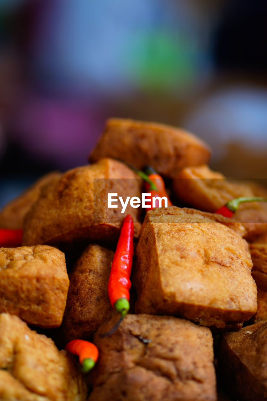 Street foods displays tahu or tofu in semarang. indonesia. in chinese new year 2023