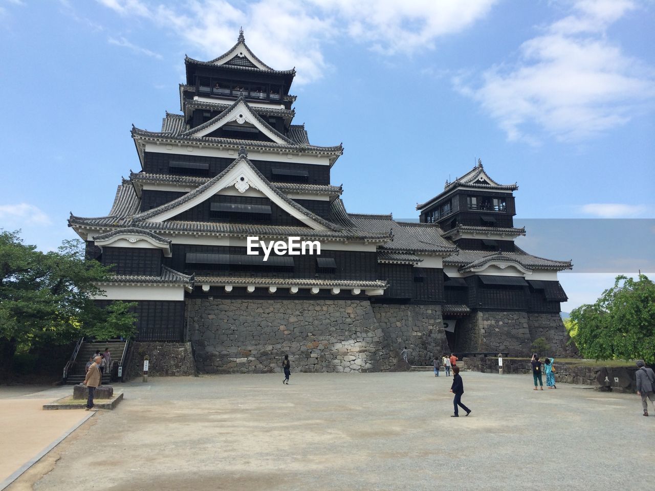 PEOPLE WALKING ON HISTORICAL BUILDING