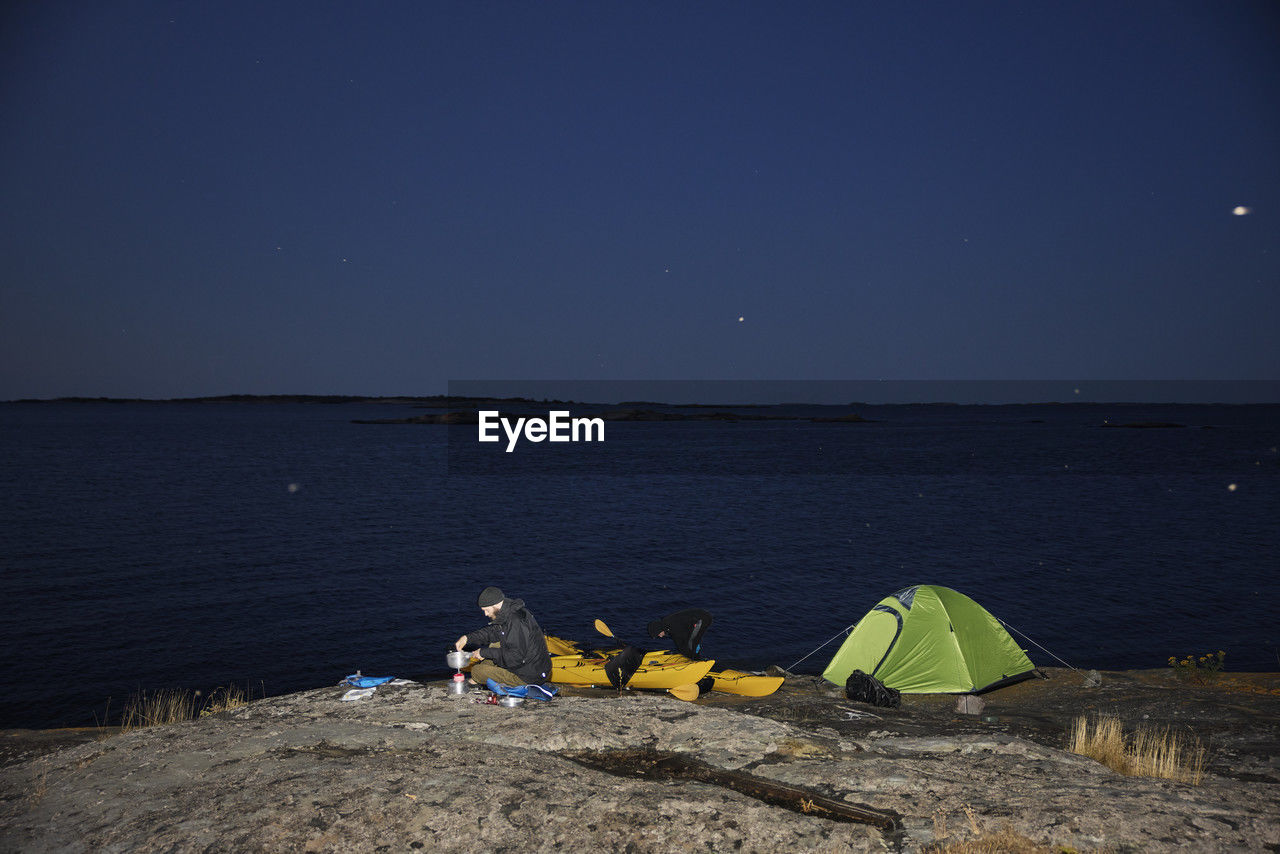View of tourist camping at sea