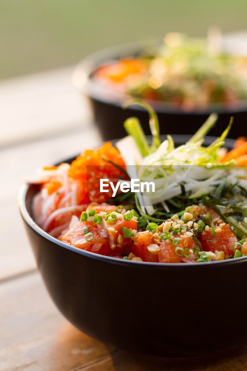 Close-up of poke in bowls