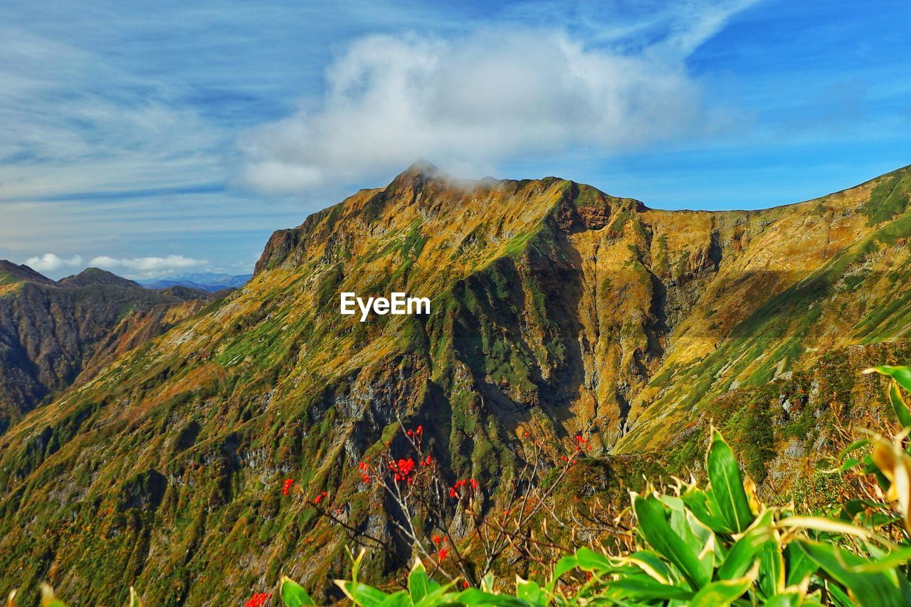 Scenic view of mountains against sky