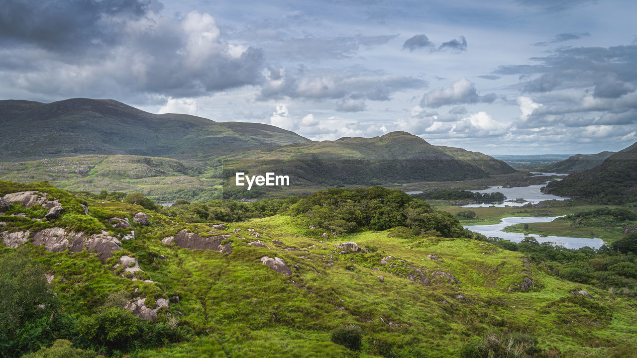 Ladies view and lakes of killarney. valley and mountains with dramatic sky, rink of kerry, ireland