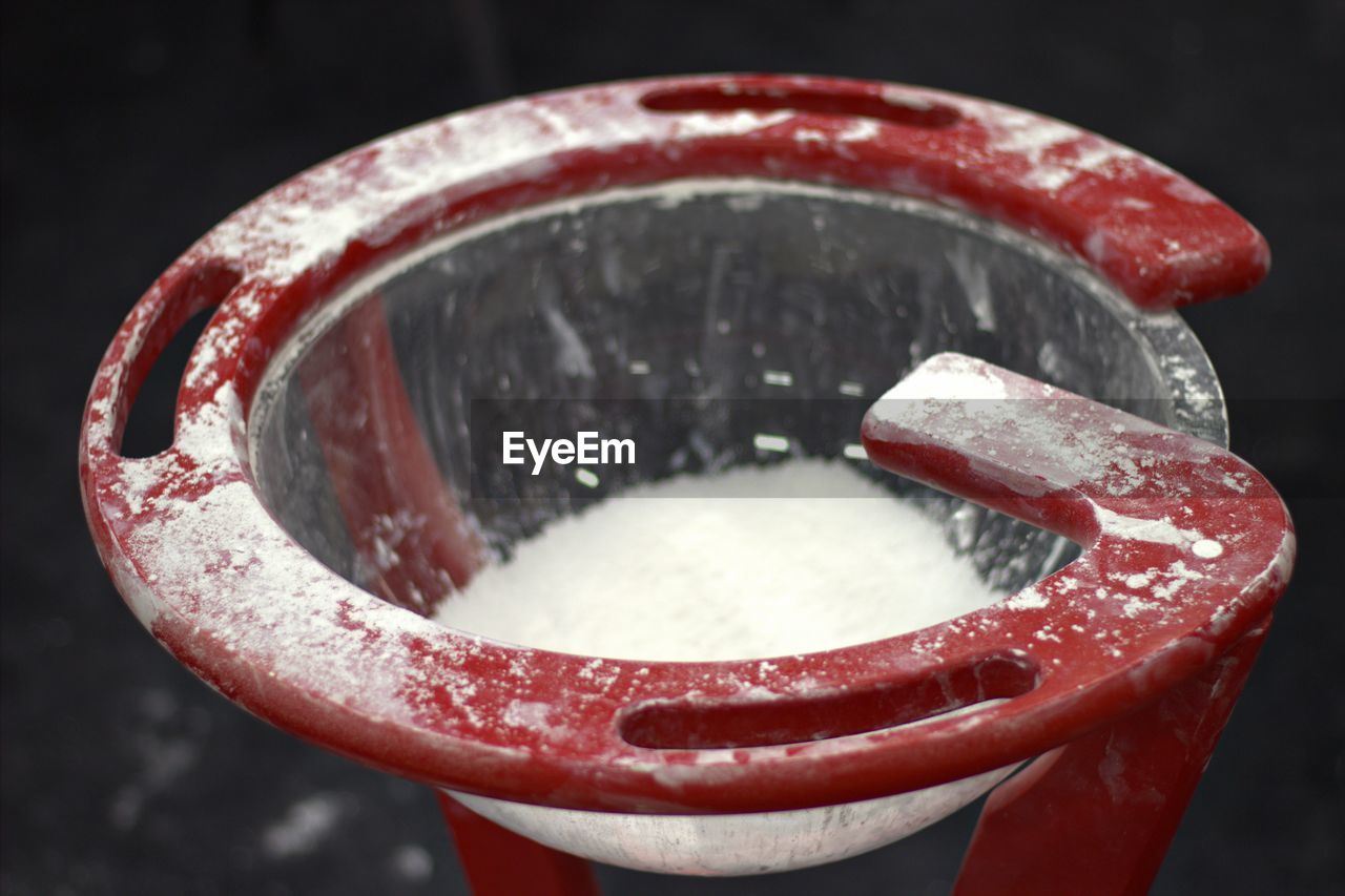 Close-up of sports chalk in container