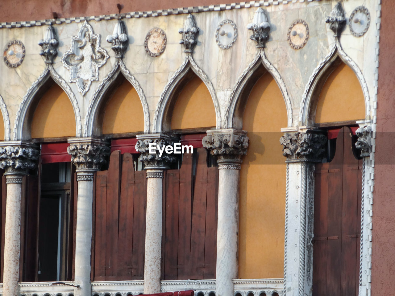 Windows of shades of brown in venice campo san polo