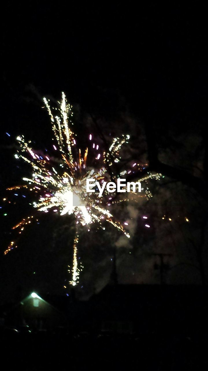 LOW ANGLE VIEW OF FIREWORKS