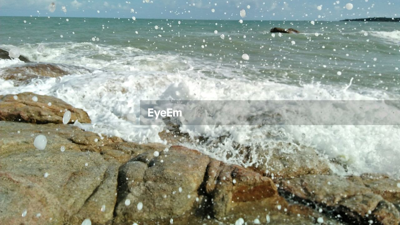 SCENIC VIEW OF SEA WAVES