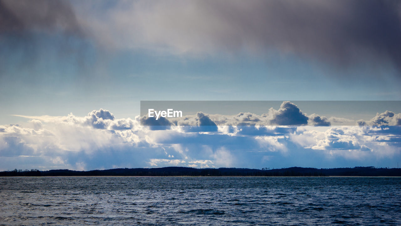 Scenic view of sea against dramatic sky