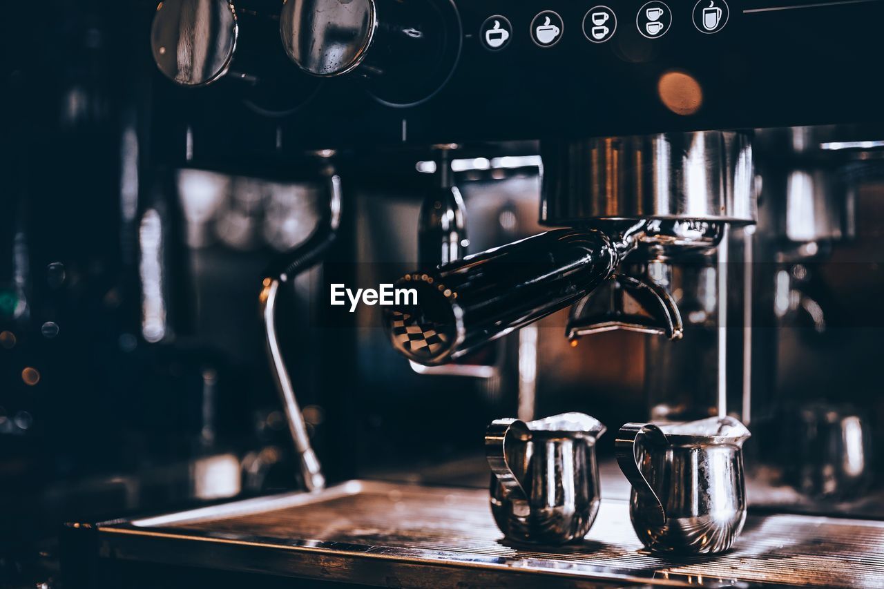 espresso machine, food and drink, coffee, coffeemaker, drink, espresso maker, indoors, cafe, coffee shop, refreshment, coffee cup, no people, close-up, mug, focus on foreground, cup, home appliance, food and drink industry, bar, business