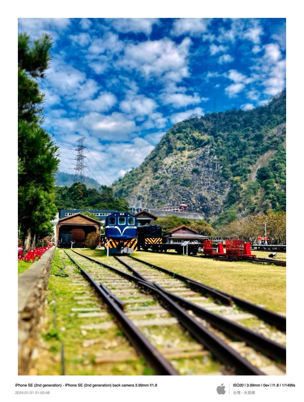 transportation, mode of transportation, rail transportation, railroad track, track, train, public transportation, sky, cloud, plant, nature, transfer print, mountain, tree, auto post production filter, land vehicle, travel, vehicle, day, no people, transport, screenshot, outdoors, architecture, motion, on the move