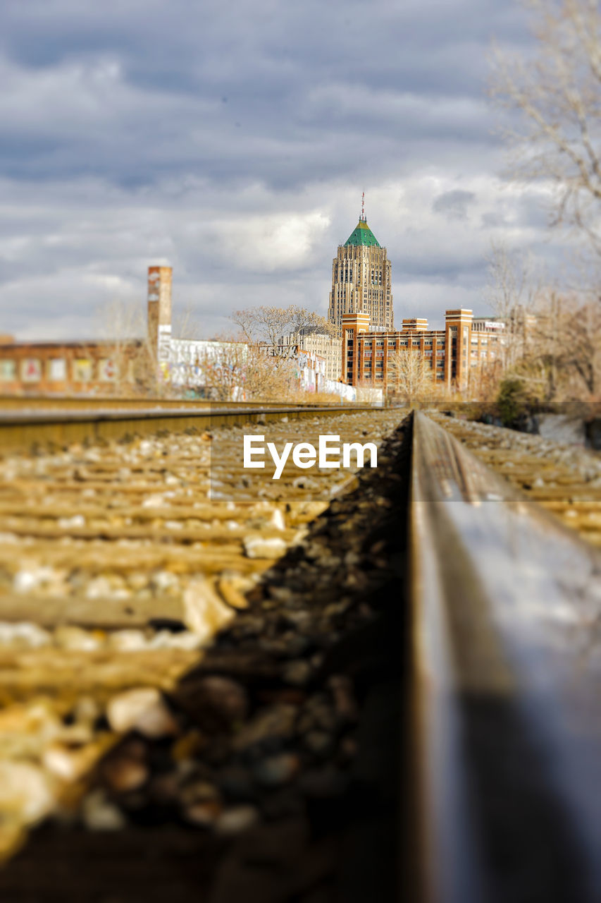 Surface level of railroad tracks against buildings