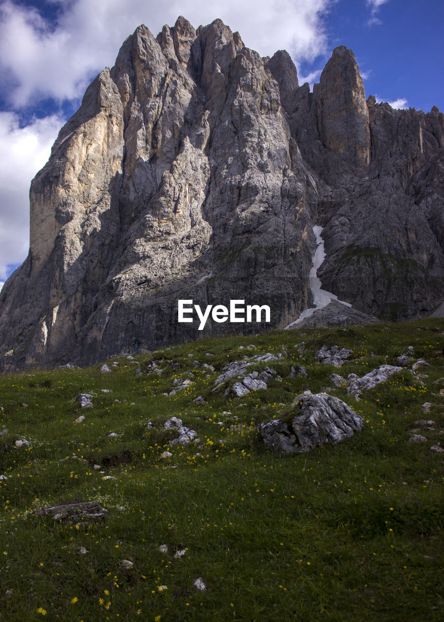 Scenic view of rocky mountains against sky in dolomites 