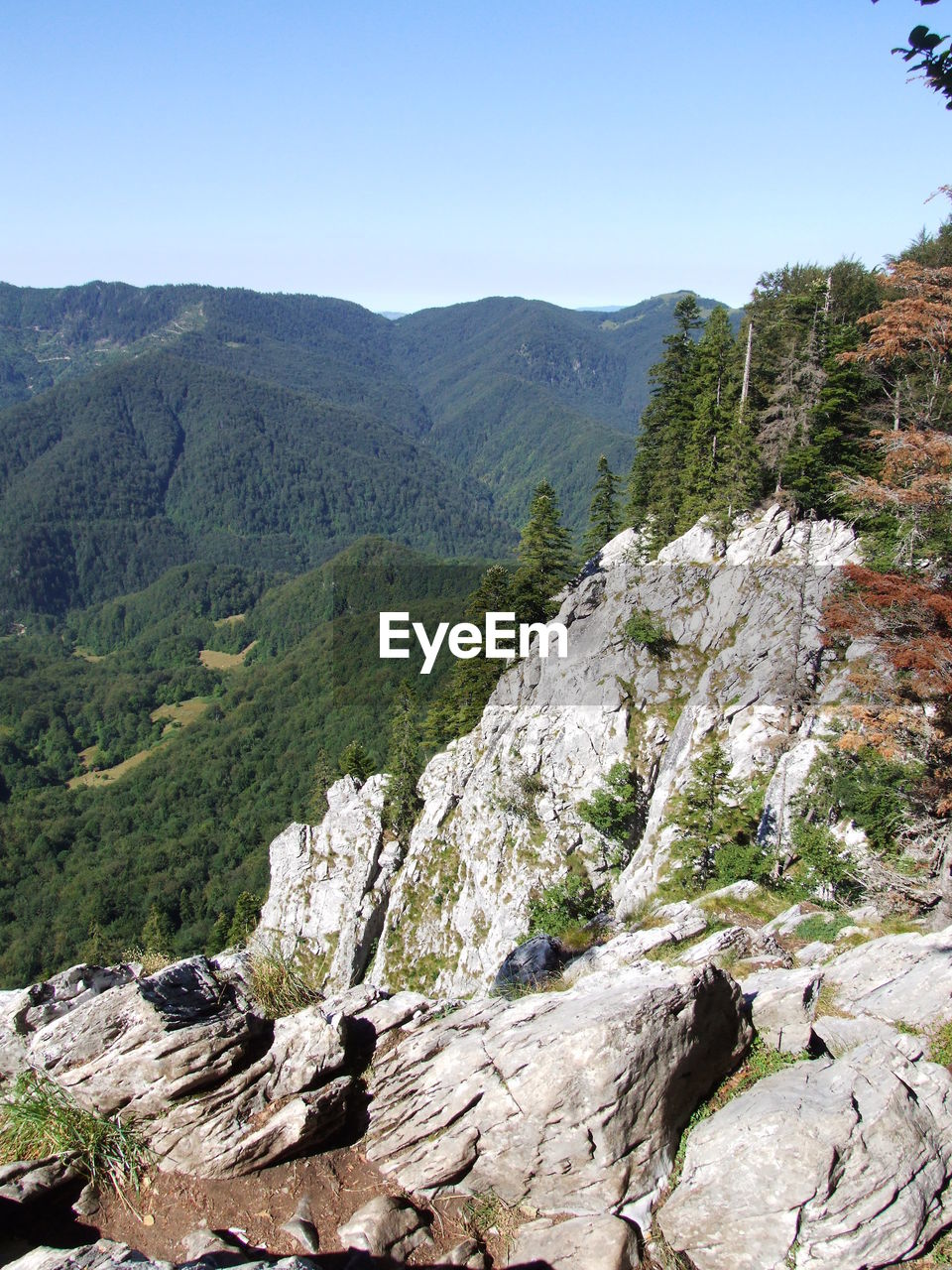 Scenic view of rocky mountains against clear sky