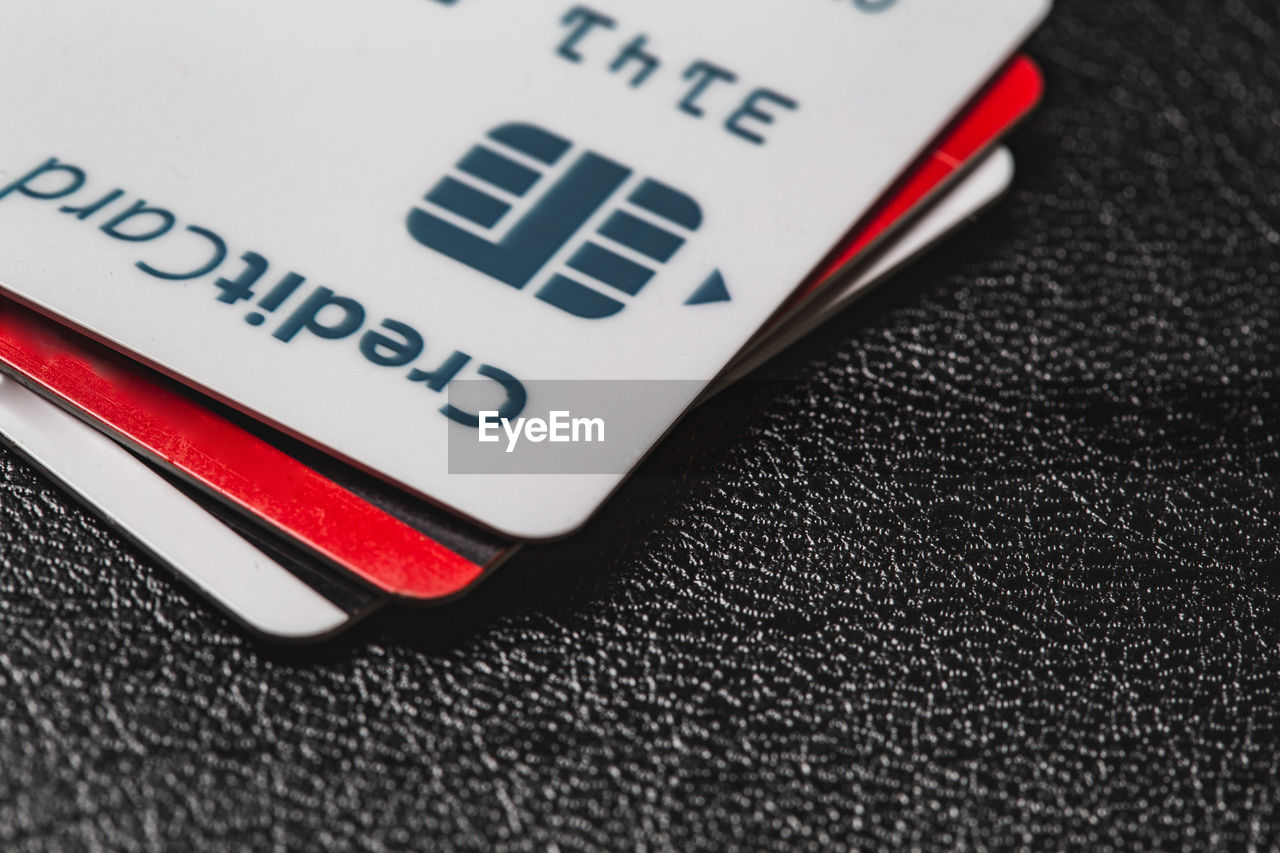 Close-up of credit cards on table