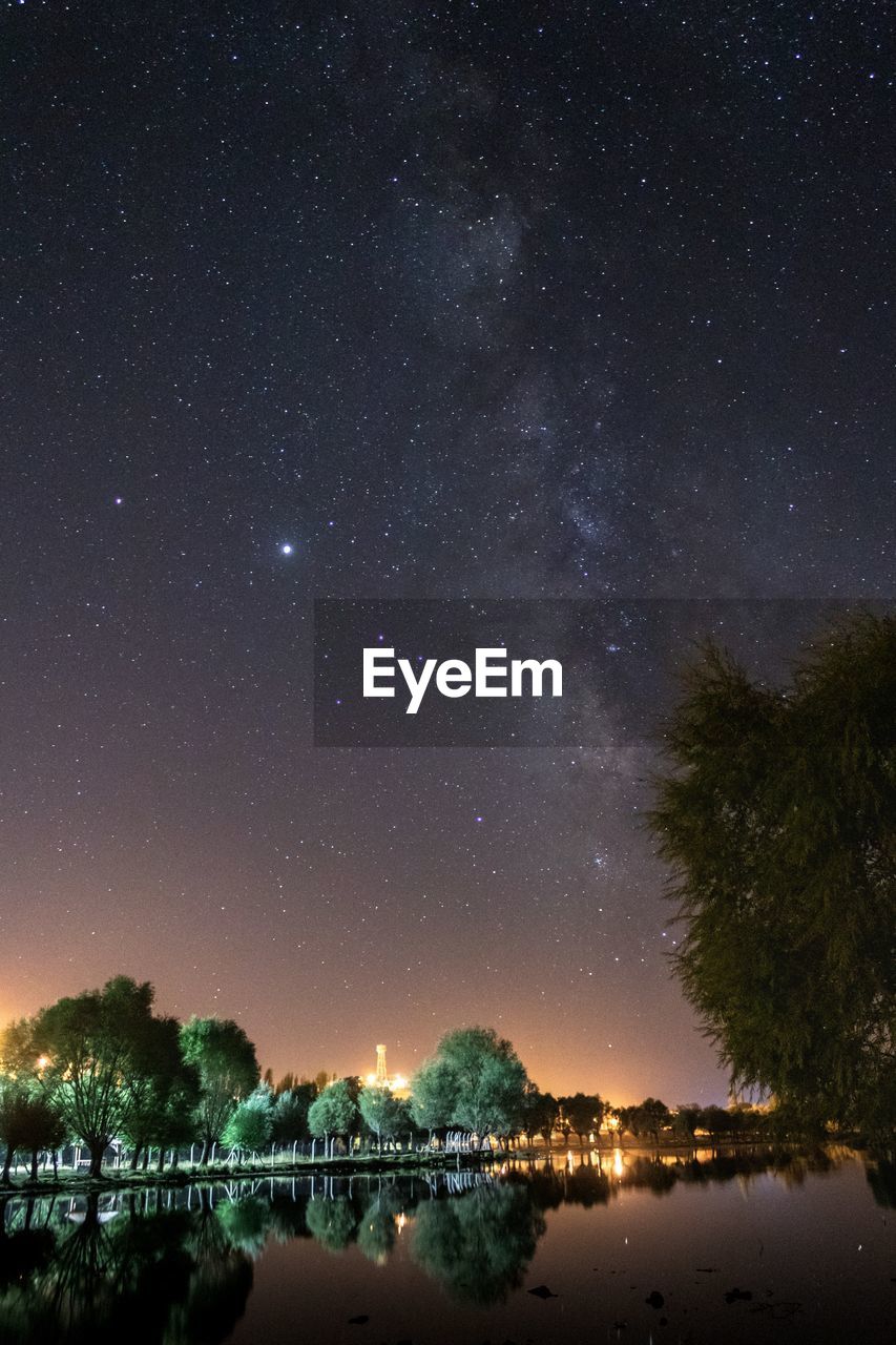 Scenic view of illuminated star field against sky at night