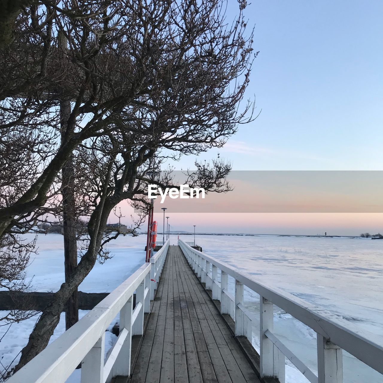 Scenic view of sea against sky during winter