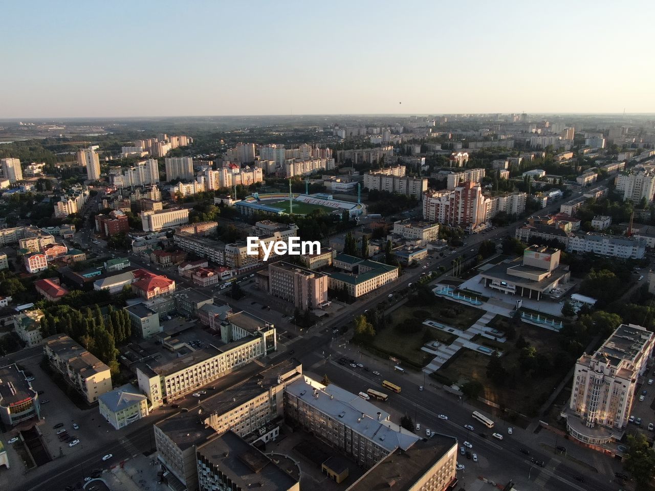 HIGH ANGLE VIEW OF BUILDINGS AGAINST CLEAR SKY