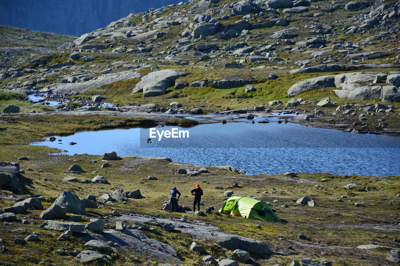 People camping at lakeshore