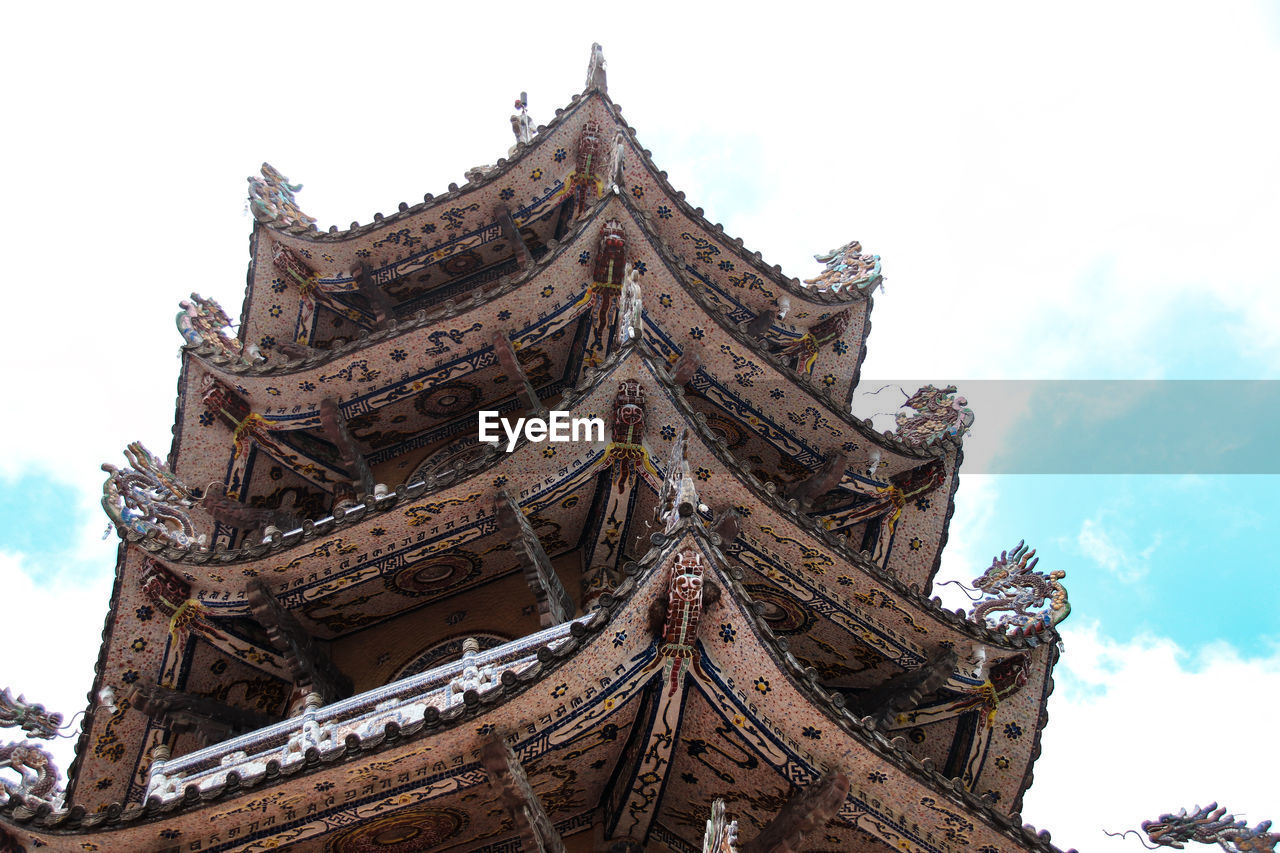 Low angle view of temple building in linh phuoc pagoda against sky