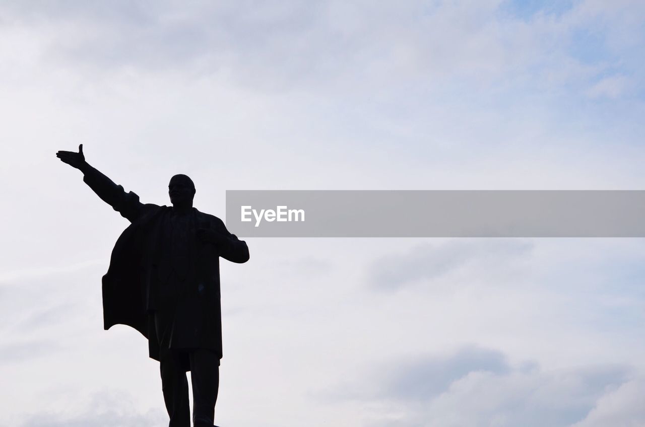 Low angle view of statue against sky