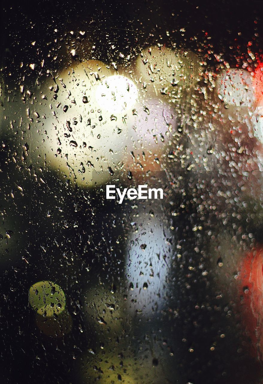 Close-up of water drops on glass