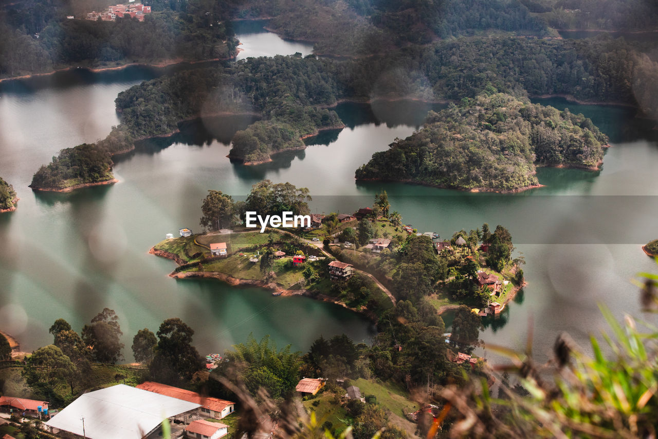 An island in the peñol-guatapé reservoir in colombia seen from the rock of guatape