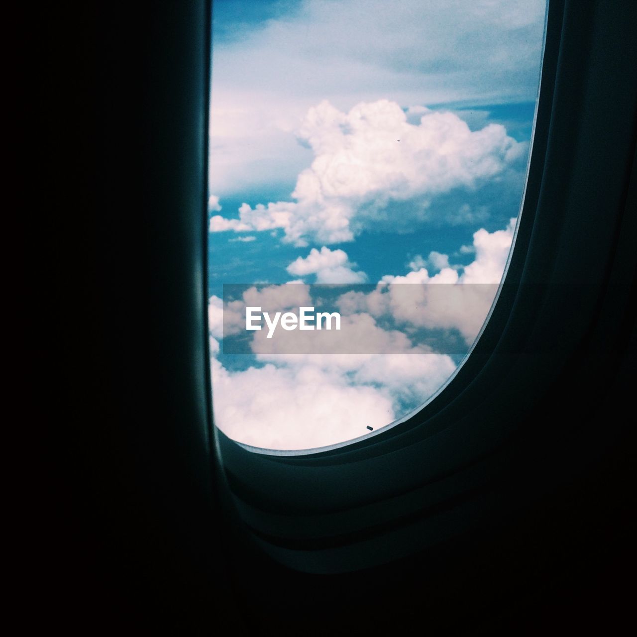 Scenic view of sky seen through airplane window