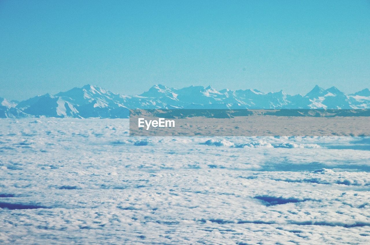 SCENIC VIEW OF LANDSCAPE AGAINST BLUE SKY