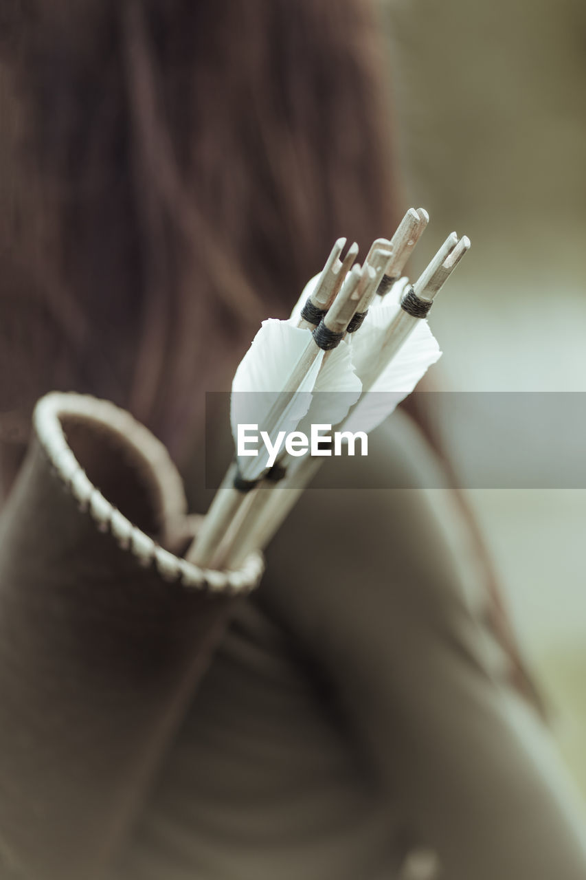 CLOSE-UP OF WOMAN SMOKING CIGARETTE