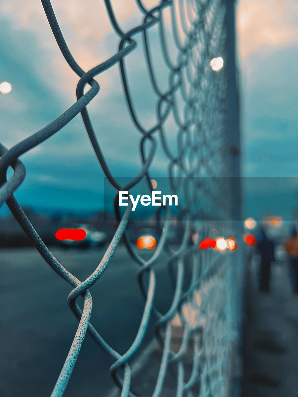 close-up of chainlink fence against sky