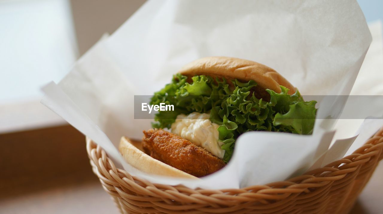 Close-up of hamburger in basket