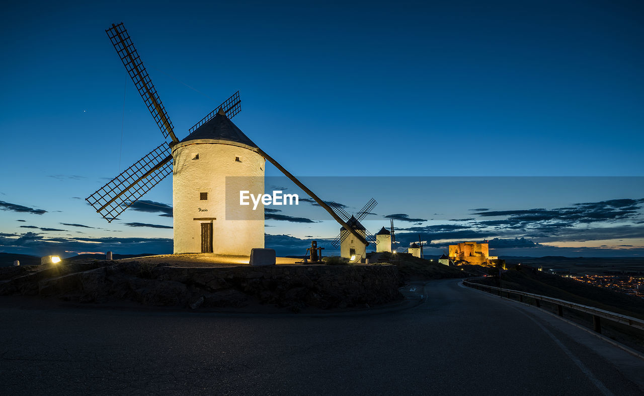 TRADITIONAL WINDMILL AGAINST BLUE SKY