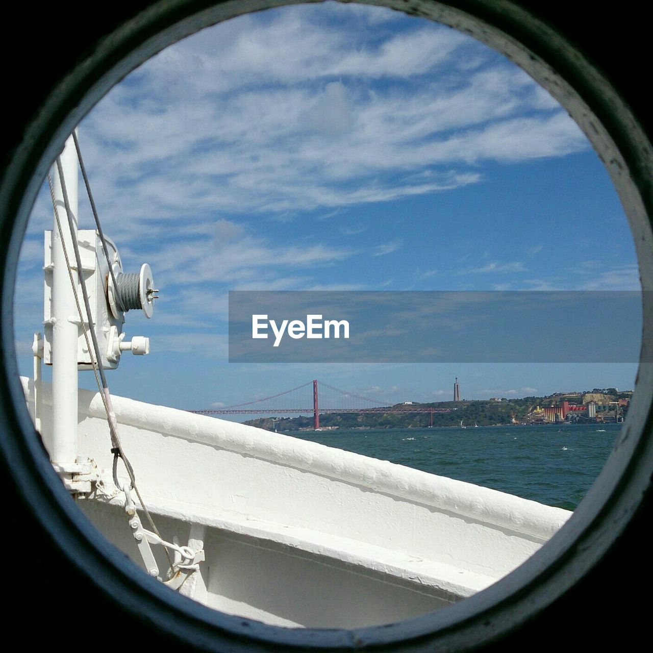 View of calm sea through circular window