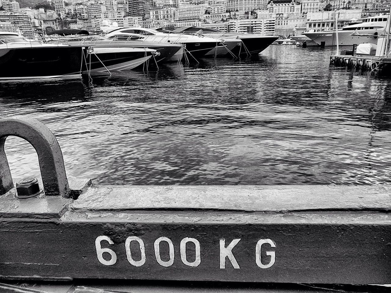 VIEW OF BOATS MOORED AT HARBOR