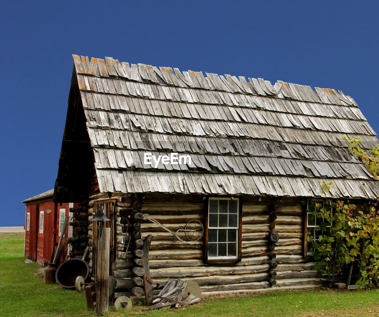 EXTERIOR OF ABANDONED BUILDING AGAINST CLEAR SKY