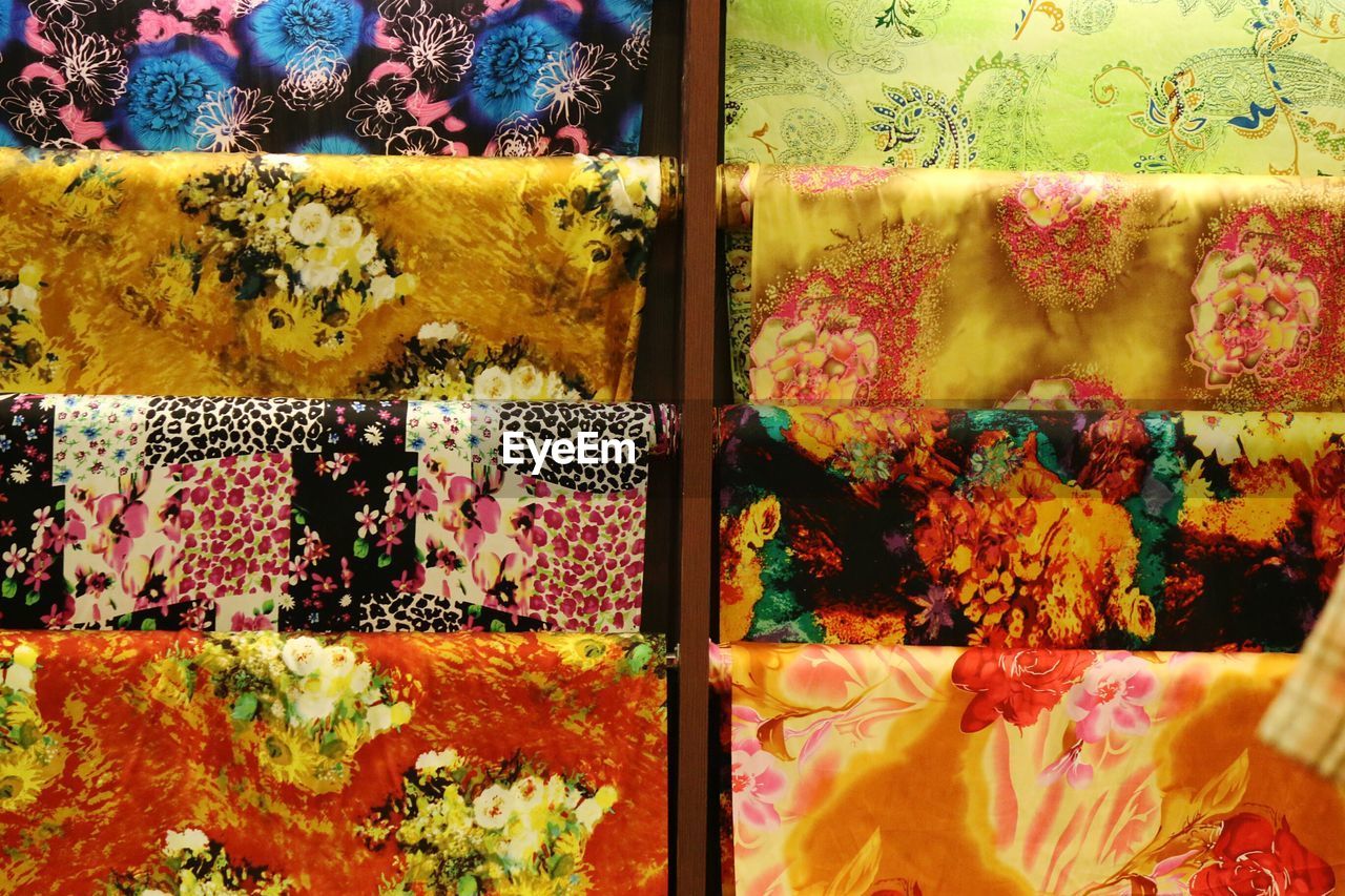 Close-up of multi colored fabrics for sale in store