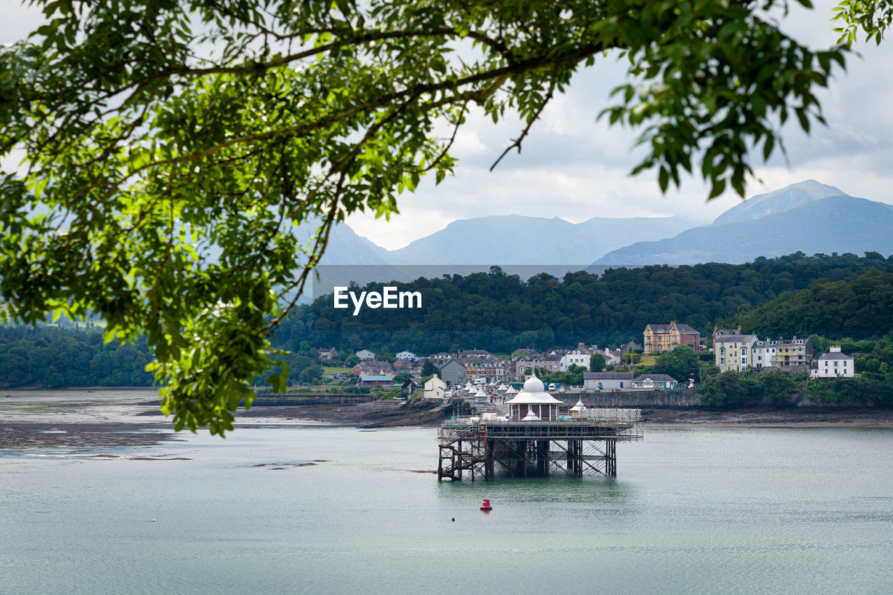 Scenic view of sea against mountains