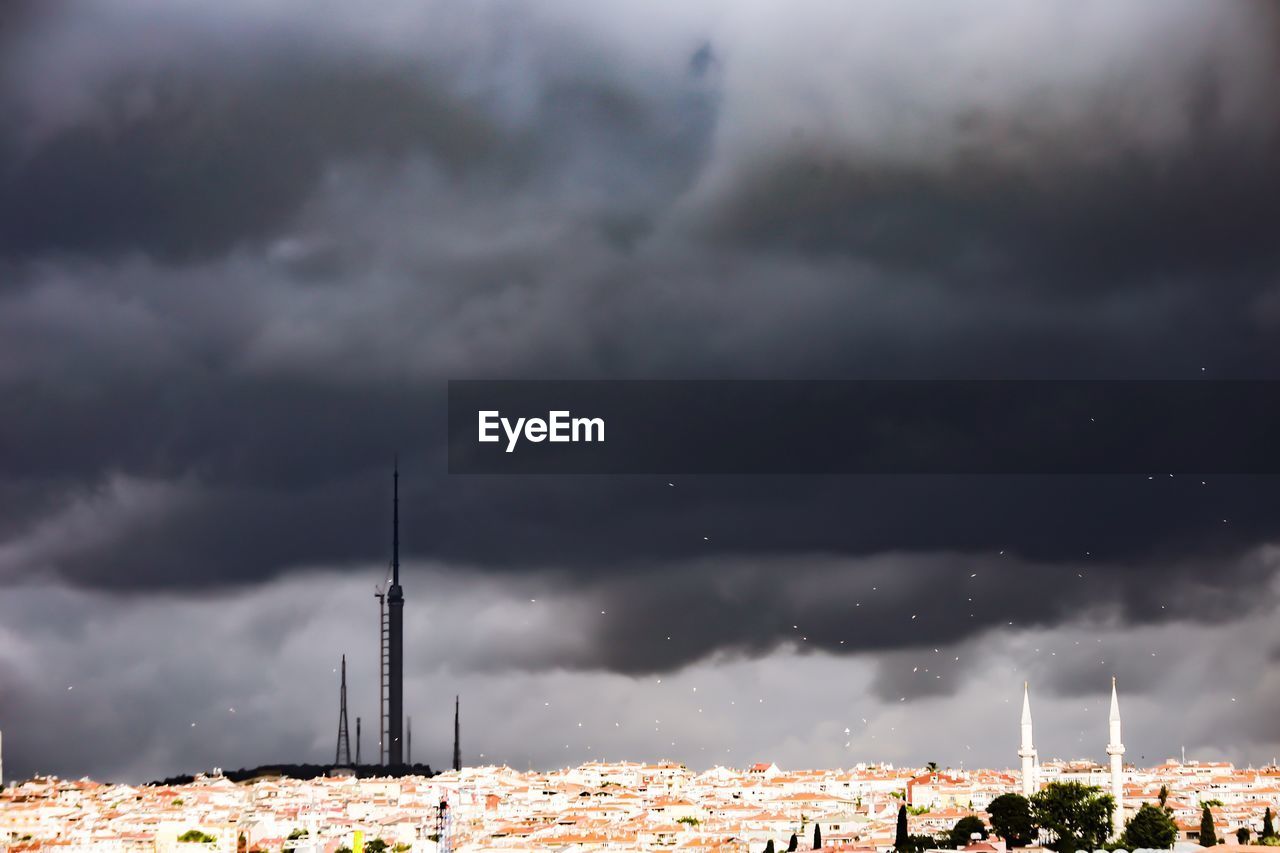 PANORAMIC VIEW OF BUILDINGS AGAINST SKY