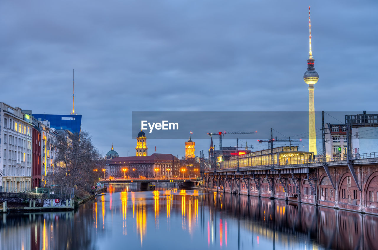 The river spree in berlin with the television tower at dusk