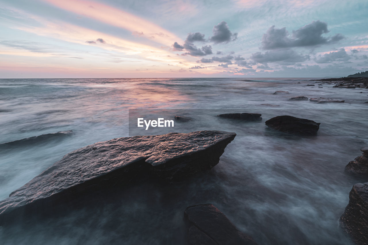 Scenic view of sea against sky during sunset