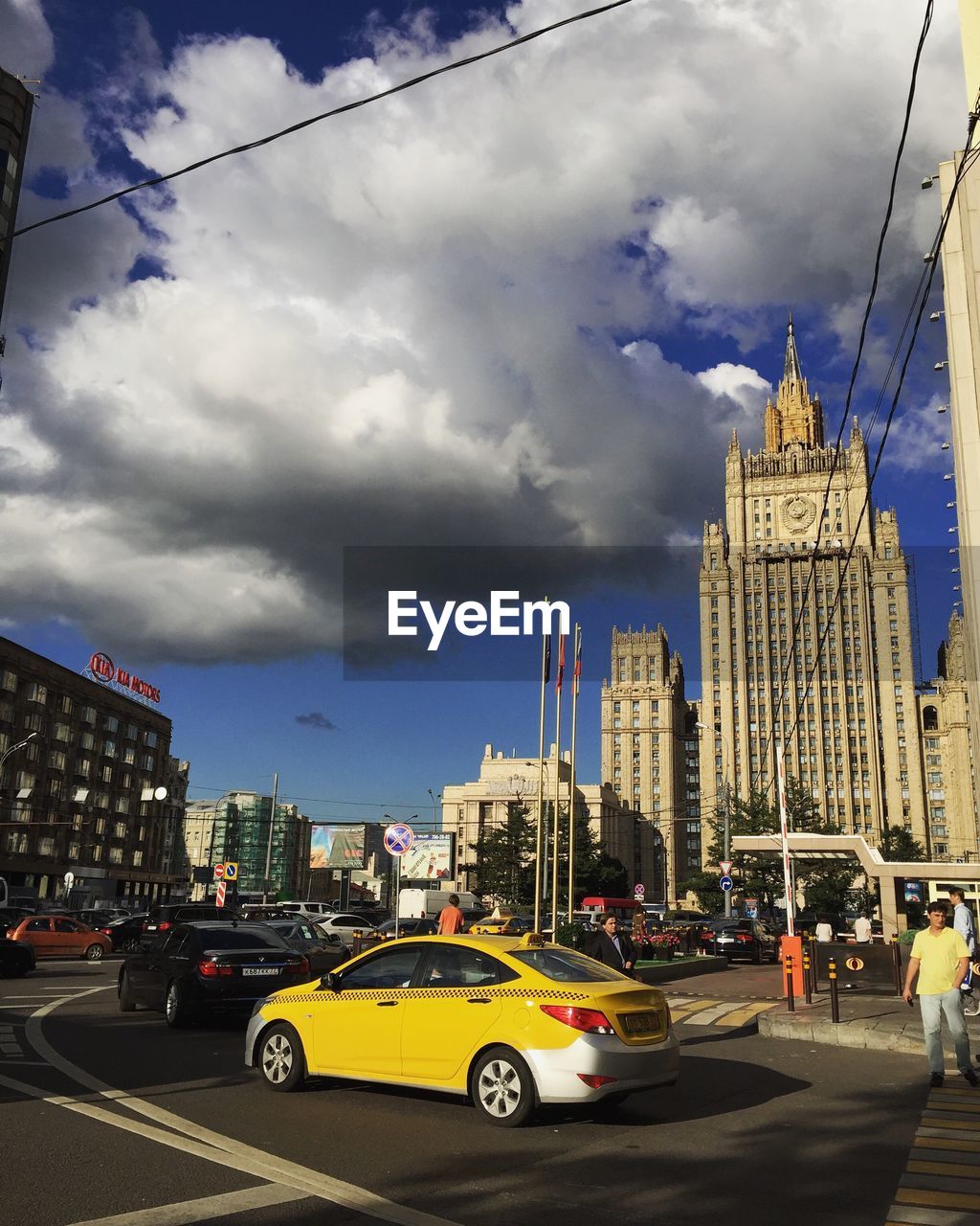 City street against cloudy sky