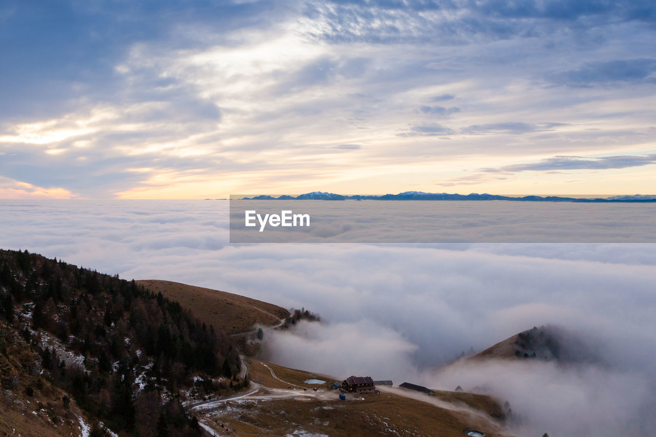 scenic view of landscape against sky during sunset