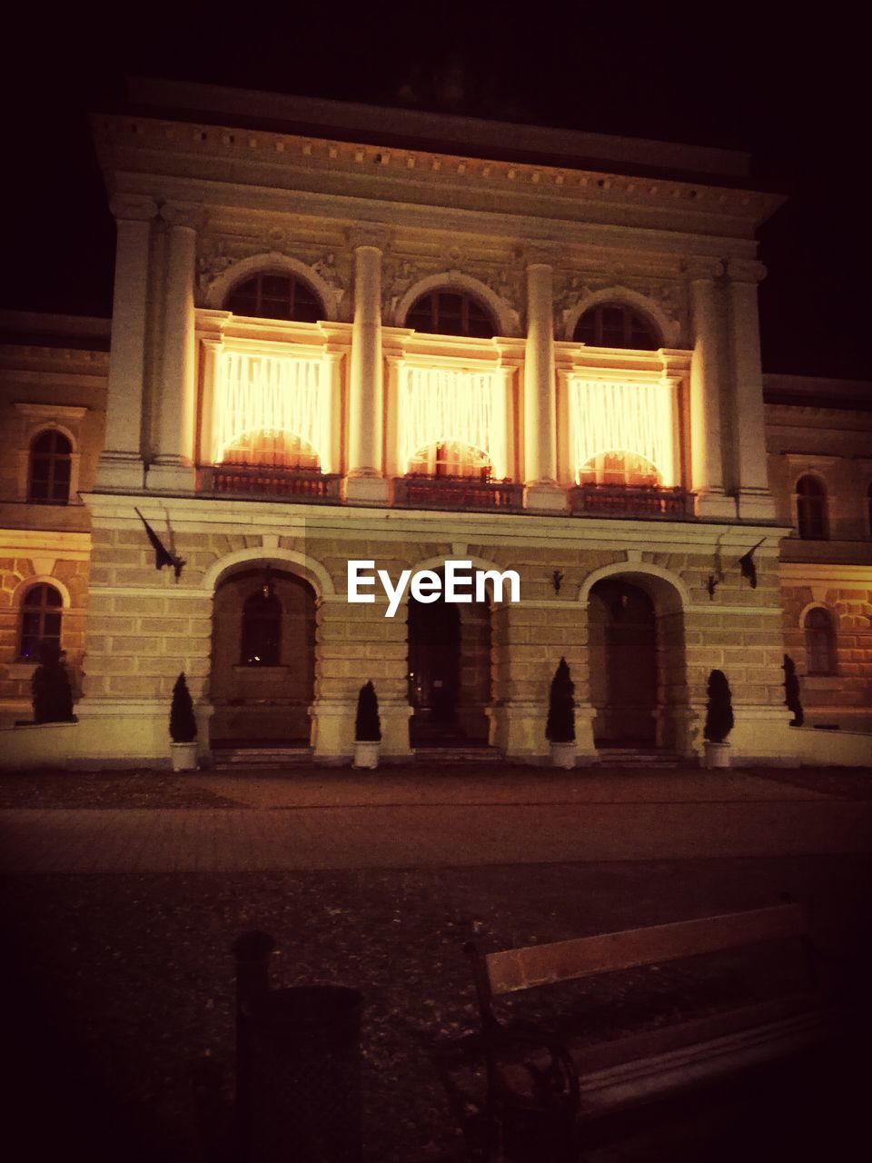 ILLUMINATED BUILDING AGAINST SKY